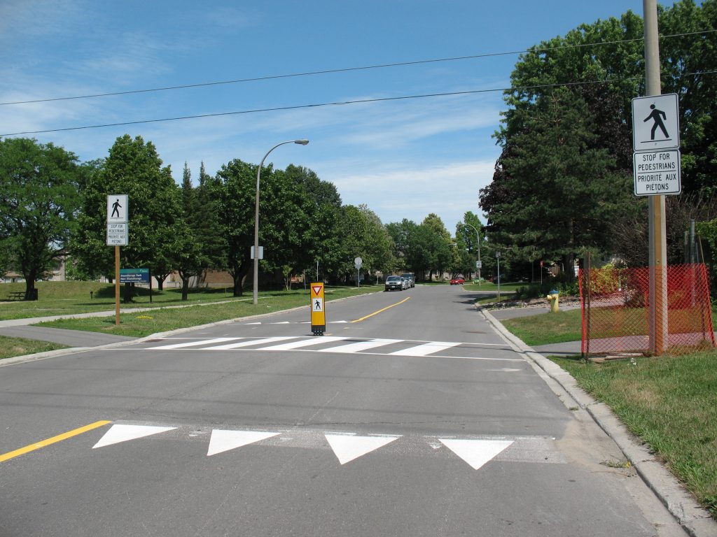 Flexible pedestrian crossover sign - City of Ottawa