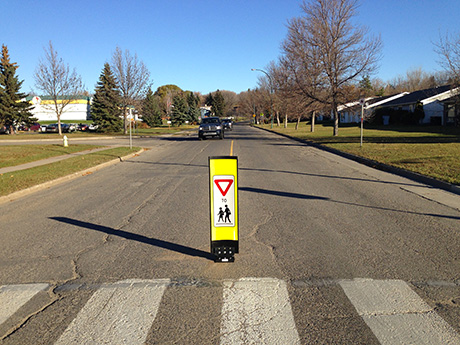 RA-8 sign in-street school crosswalk sign