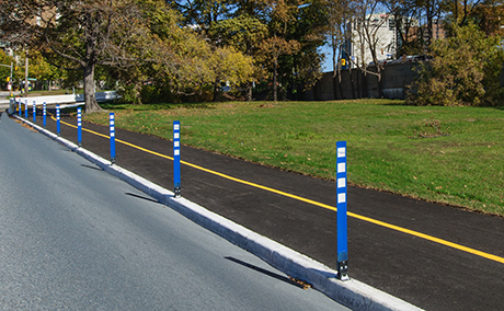 Flexible bollard delineator post on a two-way Raised Cycle Track - City of Ottawa, ON