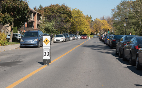 Traffic calming measure with flexible bollard - City of Montreal