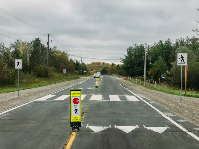 Pedestrian Crossing with in-street pedestrian sign - Peel Region - Ontario