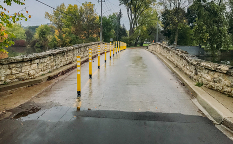 Walking lane protected with yellow flex bollards - Guelph Ontario