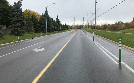 AAA Protected Bike lane with bollards / delineators / posts on a regional road - Niagara Region